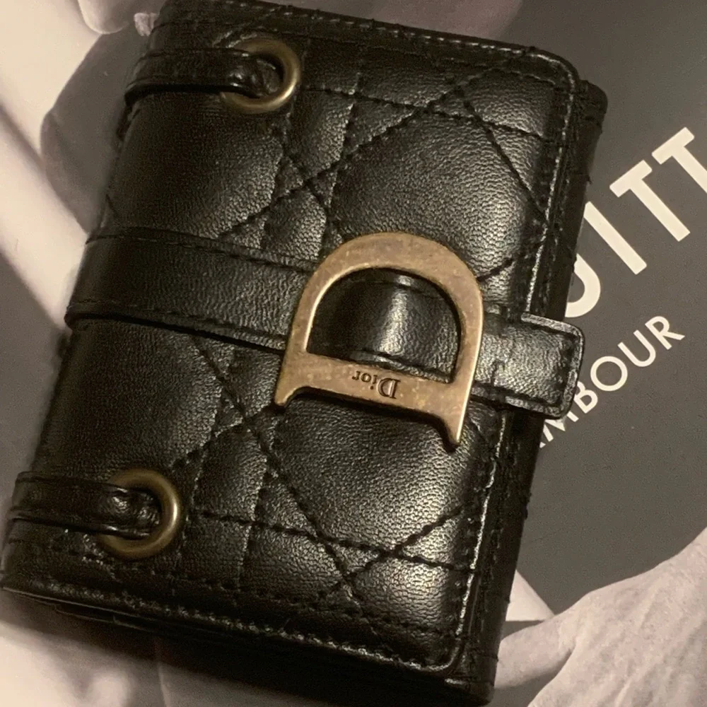 Black leather Christian Dior compact wallet